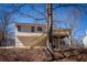 Elevated view of the home's wood deck and backyard, surrounded by trees at 2192 Stenger Rd, Douglasville, GA 30135