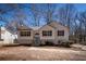 Charming single-Gathering home with a landscaped front yard and light blue front door at 2192 Stenger Rd, Douglasville, GA 30135