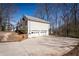 Spacious two-car garage and large driveway providing ample parking space at 2192 Stenger Rd, Douglasville, GA 30135