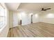 Bright living room with laminate flooring, recessed lighting, ceiling fan and window at 2192 Stenger Rd, Douglasville, GA 30135