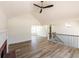 Open-concept living space with modern staircase and beautiful flooring at 2192 Stenger Rd, Douglasville, GA 30135