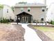 Spacious backyard featuring a pergola, a concrete path, and a well-manicured lawn, ideal for outdoor enjoyment at 3442 Old Towne Ln, Cumming, GA 30040