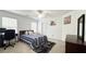 Bright bedroom features a desk area, neutral carpet, and ample natural light at 3442 Old Towne Ln, Cumming, GA 30040