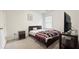 Bedroom offers a neutral color palette and ample natural light at 3442 Old Towne Ln, Cumming, GA 30040