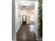 Bright entryway with hardwood floors, white wainscoting, and a door with sidelight windows at 3442 Old Towne Ln, Cumming, GA 30040