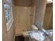 Bathroom featuring a shower, white toilet and a new vanity with granite countertop at 4015 Woodland Nw Dr, Kennesaw, GA 30152