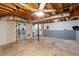 Unfinished basement featuring utilities, exposed beams, and concrete floor at 4192 Alaina Cir, Austell, GA 30106