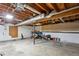 Unfinished basement with utilities, exposed ceiling, and concrete flooring at 4192 Alaina Cir, Austell, GA 30106
