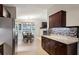 The eat-in kitchen is open to the dining area and features stainless appliances at 4192 Alaina Cir, Austell, GA 30106