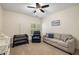 Bedroom featuring a comfortable seating area with a sofa and armchair at 626 Kimberly Ne Ln, Atlanta, GA 30306