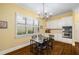 Breakfast area features custom cabinets, stainless steel appliances, and a modern chandelier at 626 Kimberly Ne Ln, Atlanta, GA 30306