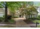 Attractive home with a well-manicured front yard and established trees creating curb appeal at 626 Kimberly Ne Ln, Atlanta, GA 30306