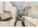 Bright kitchen featuring stainless steel appliances, island and view to breakfast area at 626 Kimberly Ne Ln, Atlanta, GA 30306