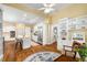 Bright kitchen features a center island, stainless steel refrigerator and hardwood flooring at 626 Kimberly Ne Ln, Atlanta, GA 30306