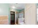 Bathroom with glass enclosed shower and soaking tub at 1625 Alcovy River Dr, Dacula, GA 30019