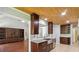 Modern kitchen with granite countertops, stainless steel appliances, and custom cabinetry at 1625 Alcovy River Dr, Dacula, GA 30019