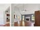 Open-concept living space with hardwood floors and seamless flow to the kitchen at 1625 Alcovy River Dr, Dacula, GA 30019
