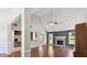 Living room with vaulted ceilings, hardwood floors and fireplace at 1625 Alcovy River Dr, Dacula, GA 30019