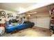 Spacious garage with room for parking and projects, complete with a classic car and ample storage at 190 Country Club Dr, Hiram, GA 30141