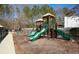 Community playground with slides and swings for outdoor fun at 190 Country Club Dr, Hiram, GA 30141