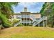 Expansive backyard view featuring a multi-level deck and staircase at 3435 Vista Creek Dr, Dacula, GA 30019