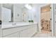 Bright bathroom with double vanity, modern fixtures, and decorative shower curtain at 3435 Vista Creek Dr, Dacula, GA 30019