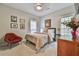 Cozy bedroom featuring stylish decor, artwork, and a comfortable bed at 3435 Vista Creek Dr, Dacula, GA 30019