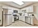 Modern kitchen with stainless steel appliances and ample counter space at 3435 Vista Creek Dr, Dacula, GA 30019