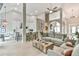 Open-concept living space with modern furniture, hardwood floors, and plenty of natural light at 3435 Vista Creek Dr, Dacula, GA 30019