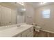 Bathroom featuring a vanity, toilet, and shower at 1720 New Orleans Way, Mcdonough, GA 30252