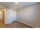 A view of the bedroom showing the closet and doorway at 1720 New Orleans Way, Mcdonough, GA 30252