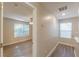 Hallway leading to bedroom with ceiling fan and natural light from the windows creates inviting space at 1720 New Orleans Way, Mcdonough, GA 30252