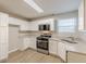 Modern kitchen featuring stainless steel appliances, granite countertops and ample cabinet space at 1720 New Orleans Way, Mcdonough, GA 30252
