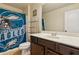 Unique bathroom with an Eagles-themed shower curtain at 2109 Cape Ivey Ct, Dacula, GA 30019