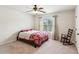 Comfortable bedroom with natural light and a rocking chair at 2109 Cape Ivey Ct, Dacula, GA 30019