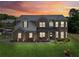 Stunning two-story brick home with manicured lawn, tasteful landscaping, and a warm, inviting facade at 2109 Cape Ivey Ct, Dacula, GA 30019