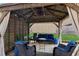 Inviting outdoor space with shaded gazebo and comfortable seating at 2109 Cape Ivey Ct, Dacula, GA 30019