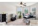 Bright home office with ample workspace and natural light at 2109 Cape Ivey Ct, Dacula, GA 30019