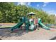 A playground with slides and climbing equipment, perfect for Gathering fun at 2109 Cape Ivey Ct, Dacula, GA 30019