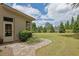 Beautiful backyard with manicured lawn, mature trees, and professional landscaping at 2205 Beaver Shop Ne Rd, Marietta, GA 30066