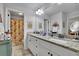 Elegant bathroom featuring double sinks with granite countertops and a separate shower area at 2205 Beaver Shop Ne Rd, Marietta, GA 30066