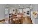 Bright dining area with modern lighting and a view of the outdoor space at 2205 Beaver Shop Ne Rd, Marietta, GA 30066