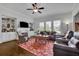 Comfortable living room with built-in shelving, fireplace, and ample seating at 2205 Beaver Shop Ne Rd, Marietta, GA 30066