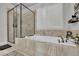 Main bathroom featuring a soaking tub, walk-in shower, and stylish fixtures at 2205 Beaver Shop Ne Rd, Marietta, GA 30066