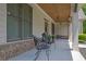 Charming front porch with decorative seating, perfect for enjoying the outdoors at 2205 Beaver Shop Ne Rd, Marietta, GA 30066