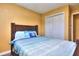 This bedroom features hardwood floors and a closet at 2326 Nicole Dr, Hampton, GA 30228