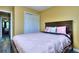This bedroom offers hardwood floors and a closet at 2326 Nicole Dr, Hampton, GA 30228