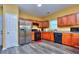 Well-equipped kitchen with stainless steel appliances, dark cabinets, and ample counter space for cooking at 2326 Nicole Dr, Hampton, GA 30228