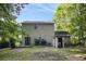 The backyard is wooded with a small shed and patio at 430 Pilgrim Ln, Powder Springs, GA 30127