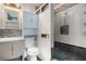 Bathroom featuring stylish tiling in shower and sink at 430 Pilgrim Ln, Powder Springs, GA 30127
